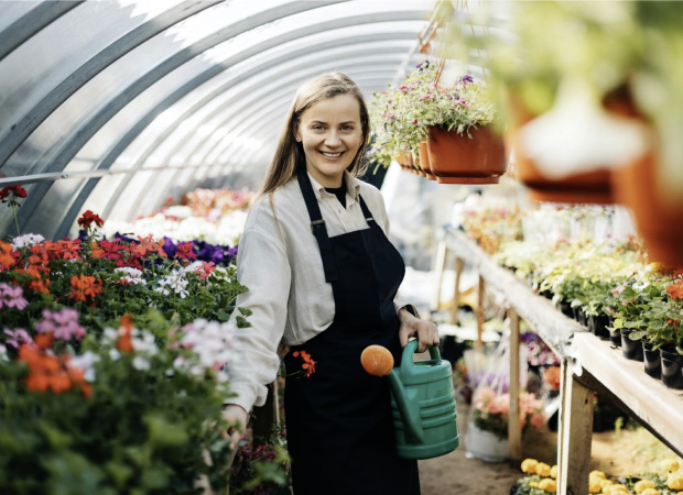 Gardener in Greenhouse